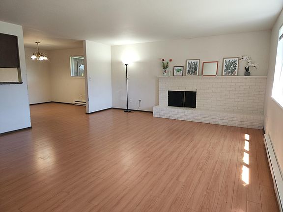 Spacious living/ dining rooms with hardwood floors