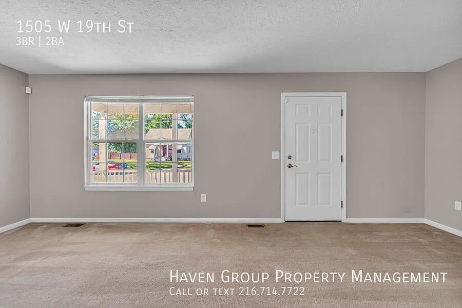 1505 W 19th St, Lorain, OH 44052- Spacious 3-bed 1.5-bath single-family home! — Photo 3