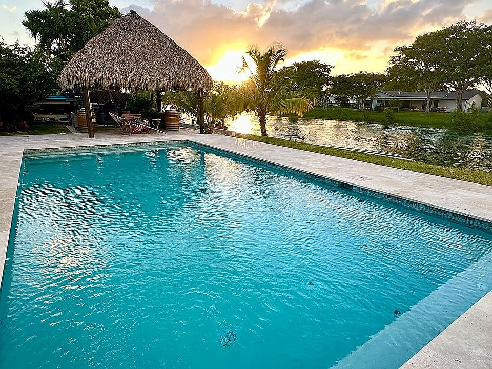 View of pool and lake 