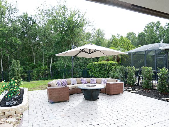 Large extended private patio. Furniture included. Rent includes lawn maintenance & Pest control.