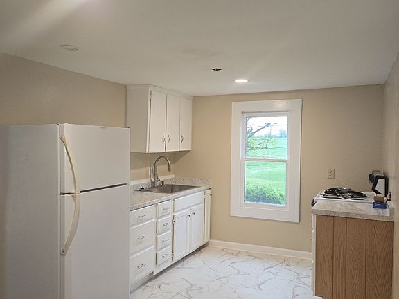 The kitchen angle from the top of the stairs.