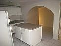 Kitchen island with arch entry