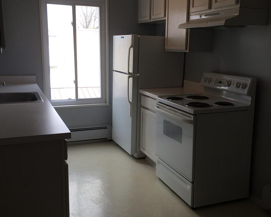 Kitchen with small pantry cupboard