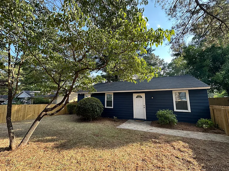 front entrance and yard (fully fenced)