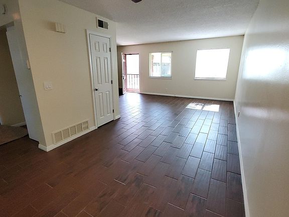 Dining room area open to spacious living room with tons of natural light!