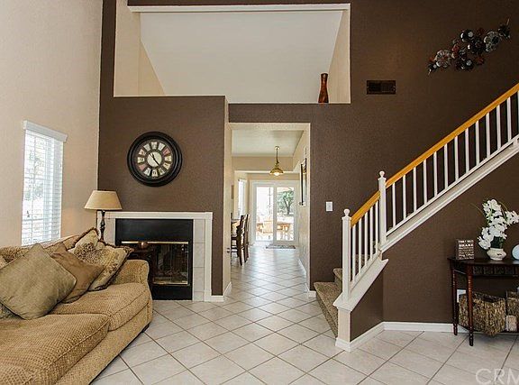 Floorplan flows from family room to dining room. Custom paint throughout.