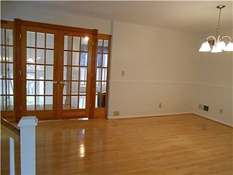 Dining room with gleaming hardwoods
