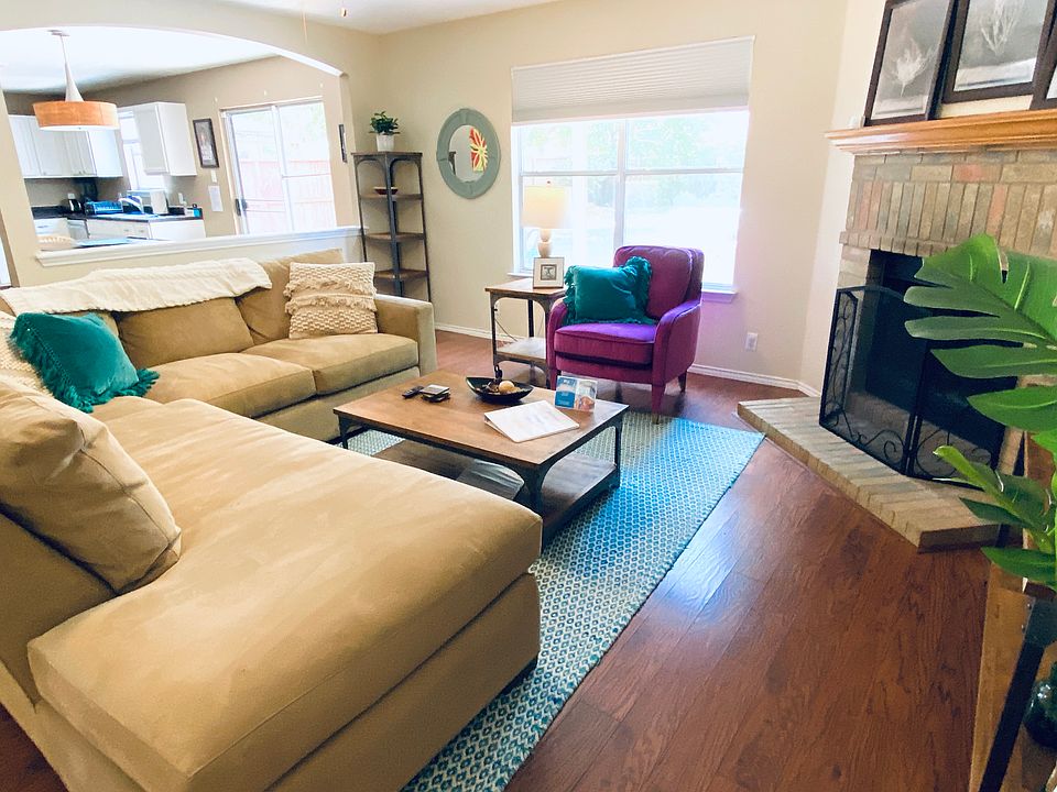 Walk in to your spacious, open plan downstairs. Working fireplace, dine-in kitchen, coat closet, laundry room, and half bath.