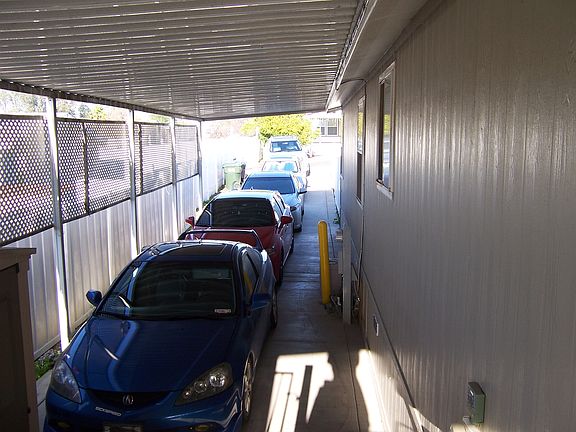 CARPORT AND LONG DRIVEWAY