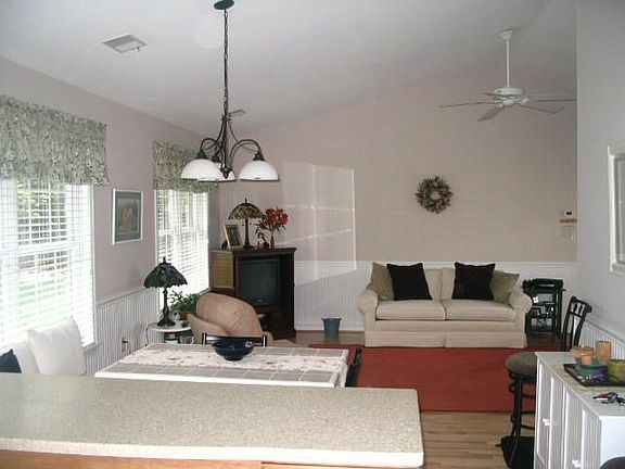 Kitchen looking into dining/living