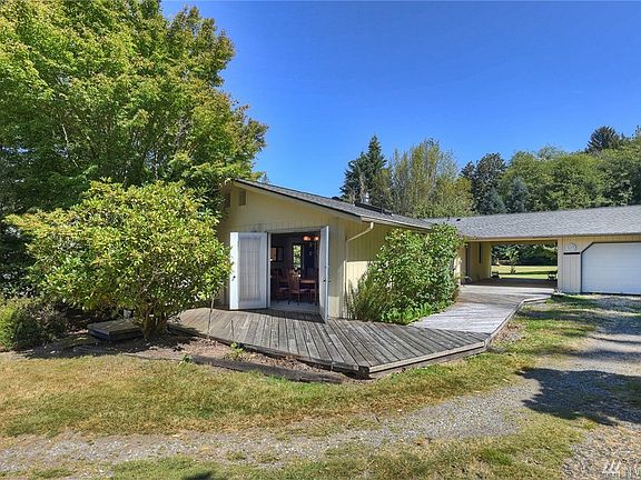 French doors open to formal dining room