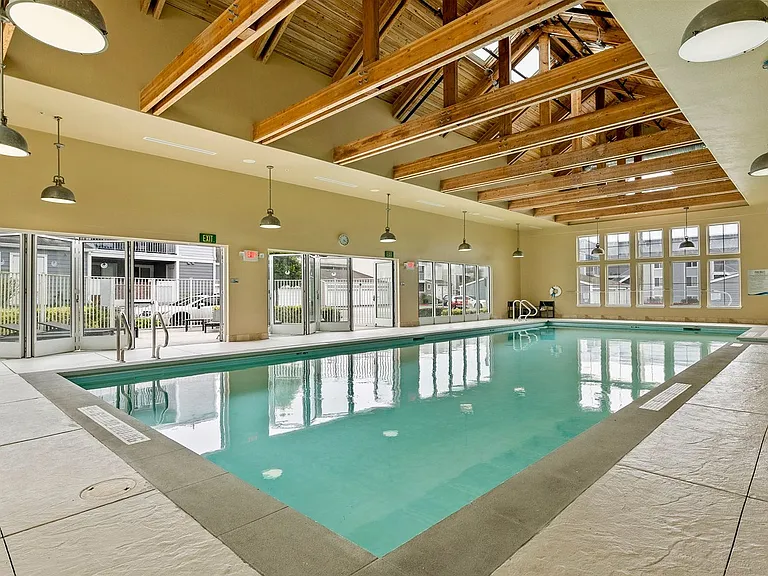 Indoor swimming pool with underwater speakers
