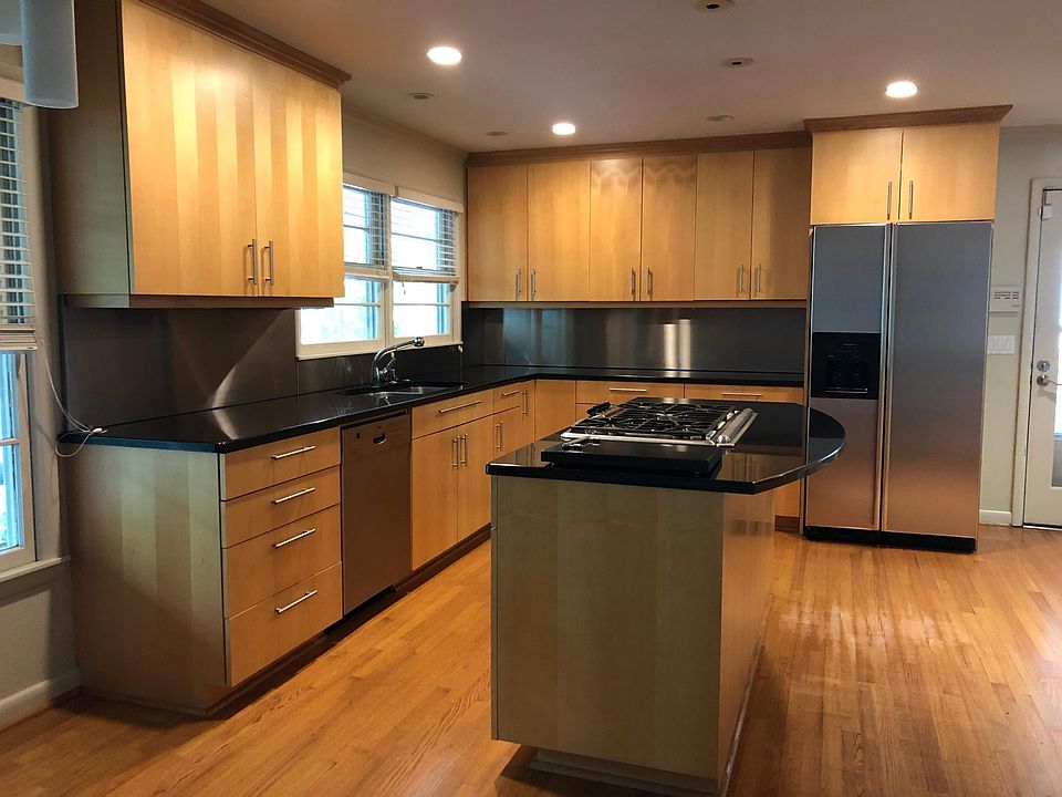 Renovated kitchen- stainless steel appliance, granite counters, maple cabinets