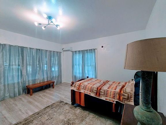 Lots of windows bedroom