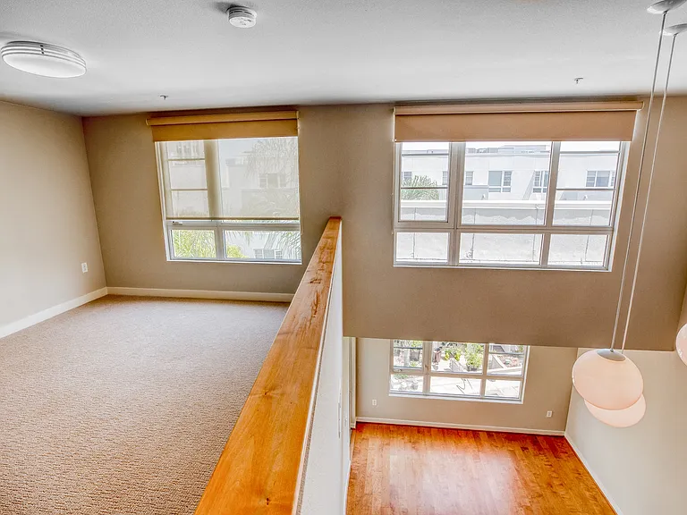 Loft-style living available in the townhomes with large windows for beautiful light
