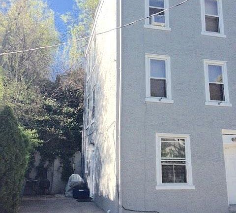 Townhouse with off street parking/patio.