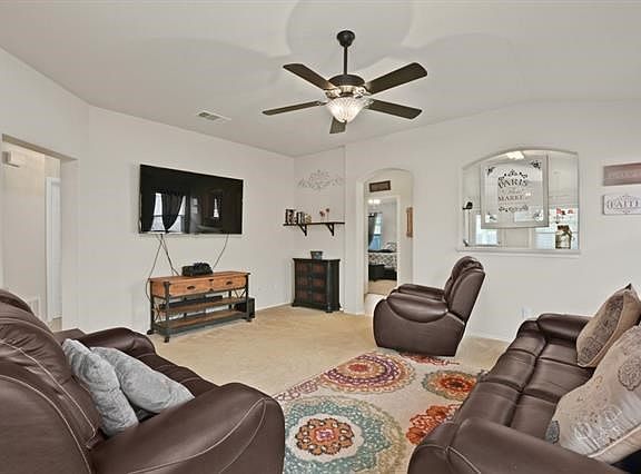 Decorative arches and rounded corners top off the character of this home.