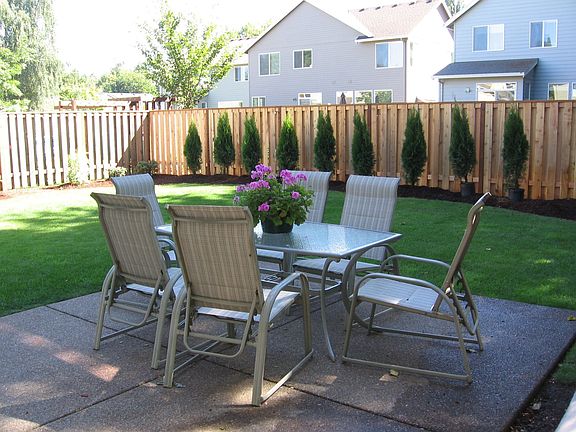 Fully fenced yard w/new landscaping