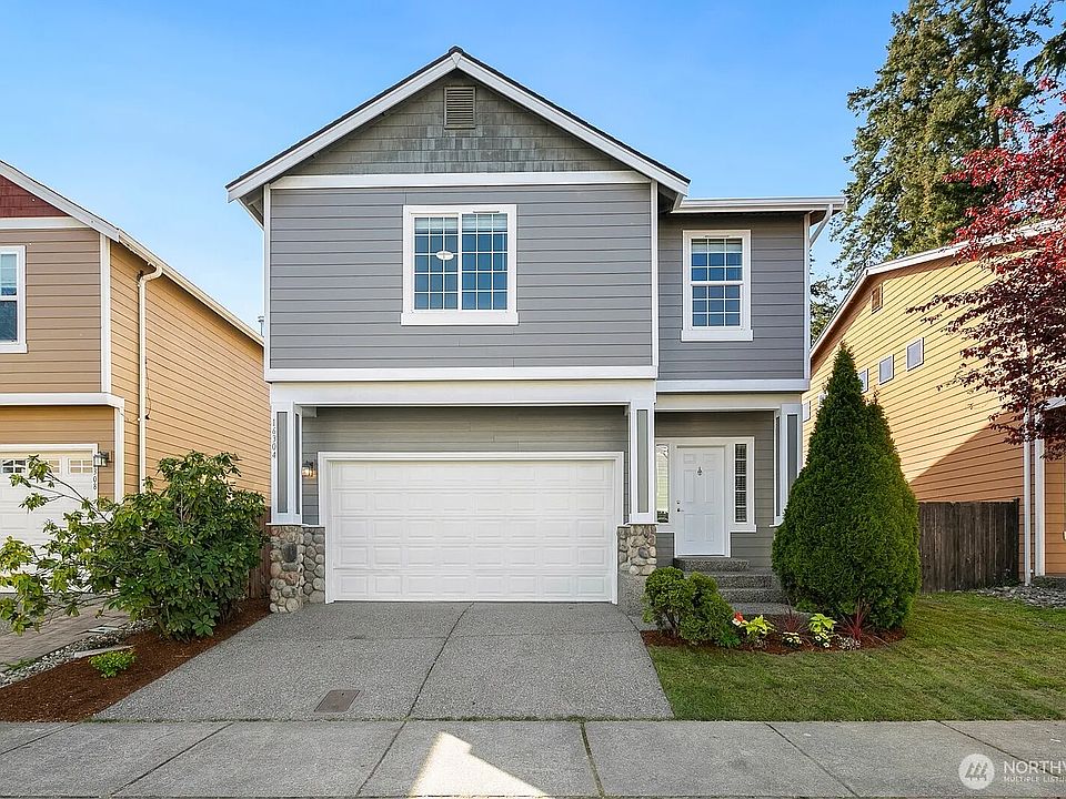 VIEW OF FRONT, ATTACHED GARAGE, ADDITIONAL PARKING