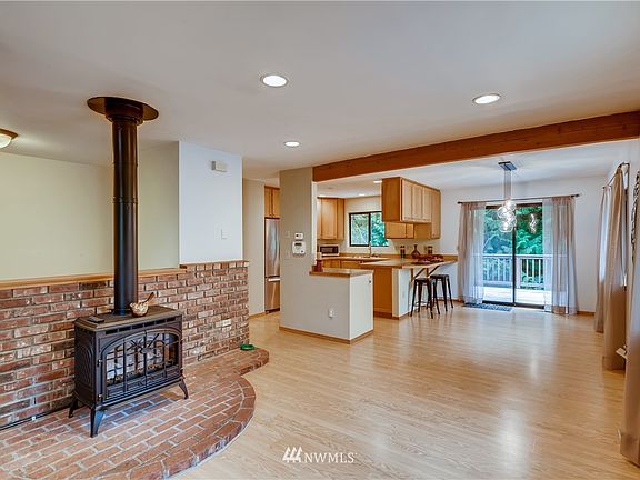 Living room flows into the dining room and open kitchen.