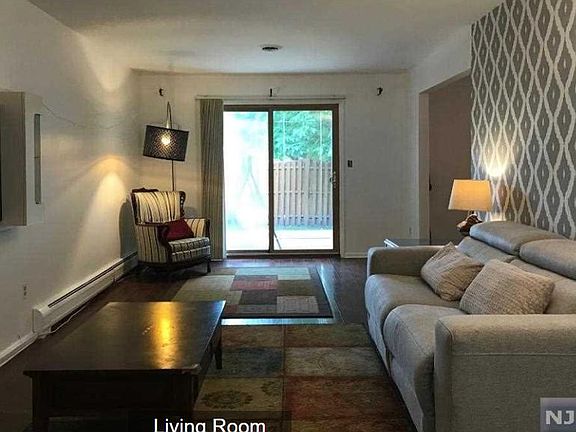 Living room taking straight to deck outside.