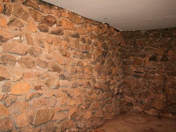100 year old stone walls  Isn't this a great place to build a wine cellar.