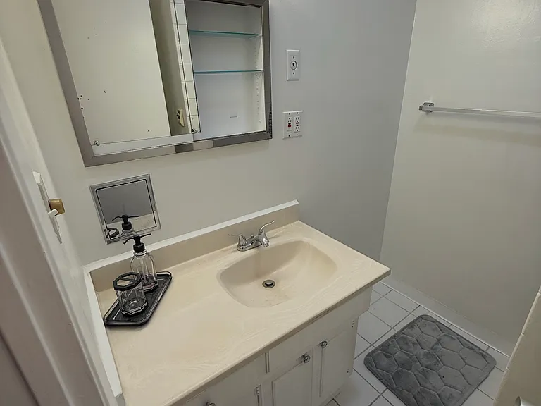Bathroom with "TWO" different lighting choices, & heater & fan!
Plus, hidden shiny wall compartments.