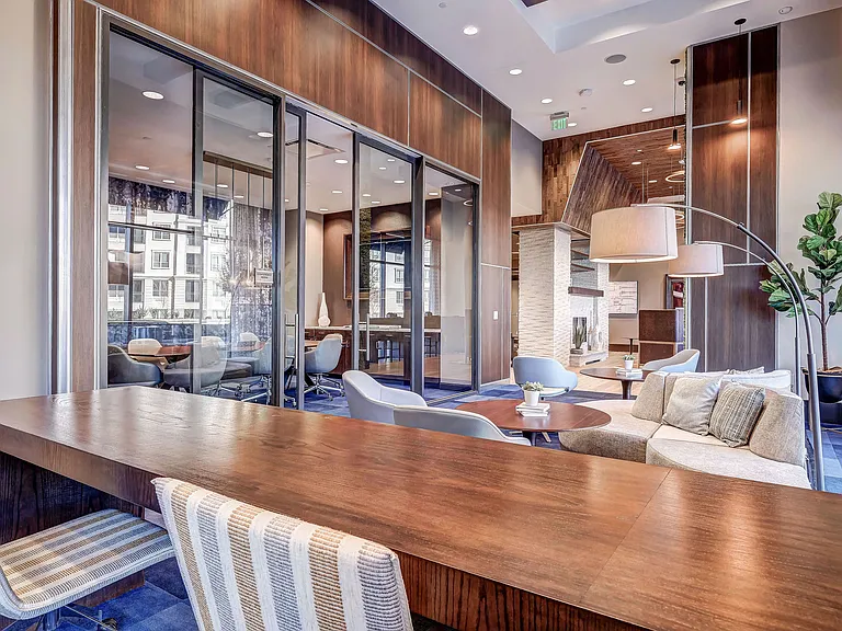 Modern conference room with stunning light fixtures and a TV
