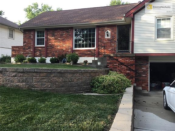 Great curb appeal with impressive retaining walls