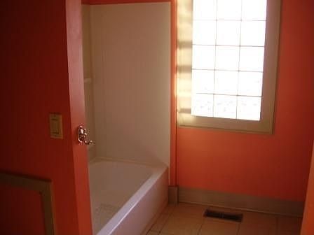 Spacious Tiled bathroom