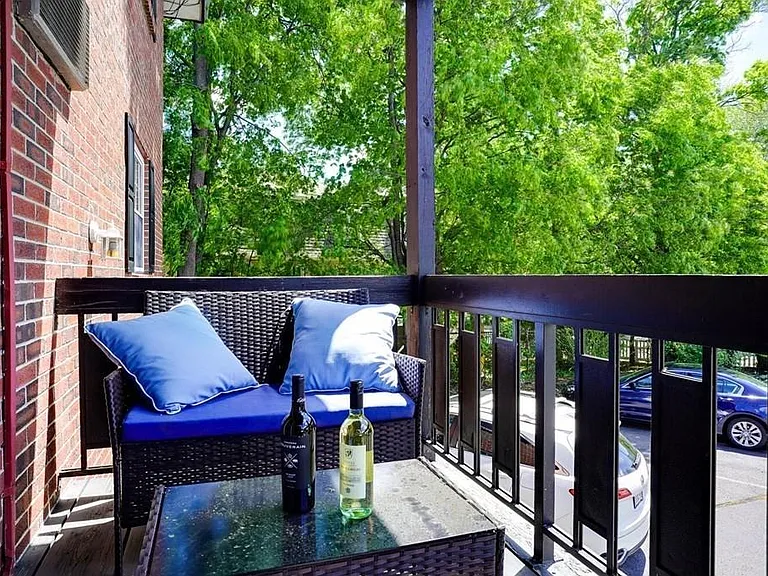 Private Balcony above parking lot