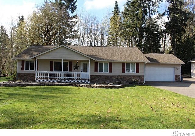 Country cutie with attached 2 car garage and massive shop with 2 covered RV spaces.  Plenty of room to garden and play in private setting close to town.