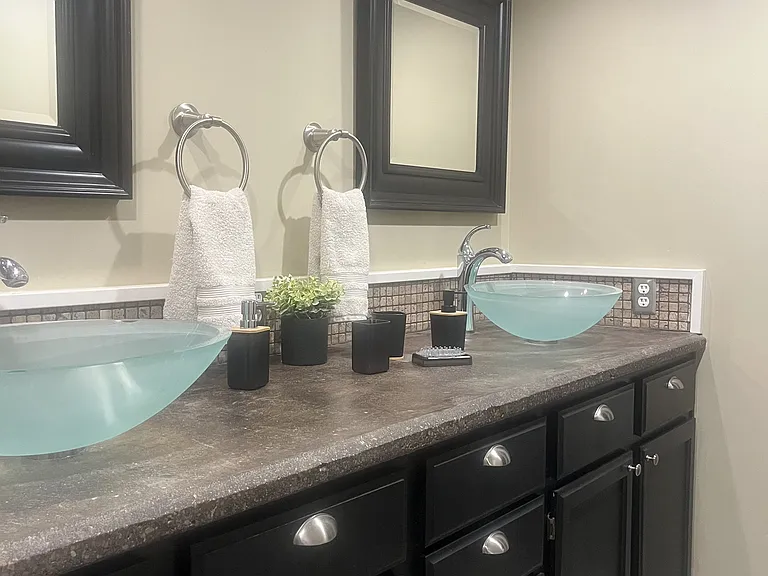 En-suite main bathroom _ with dual glass vessel sinks