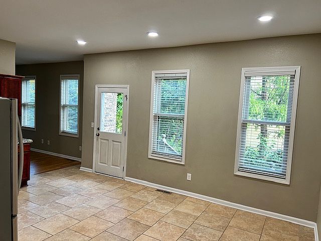 Huge kitchen area for table and chairs.