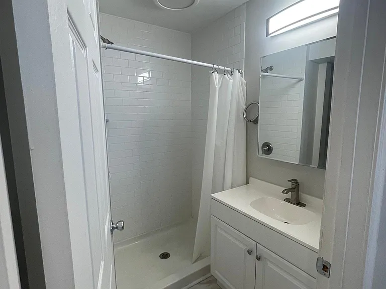 Subway tiled shower stall
Large vanity 
Medicine cabinet/ double
Led lighting