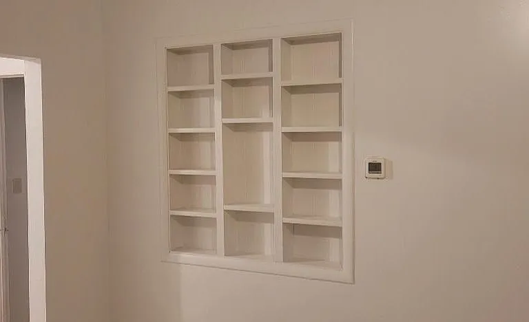 Living room with built in bookshelf
