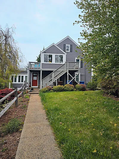 View from the driveway. Enjoy the private balcony on the second floor, directly off the enclosed mud room.