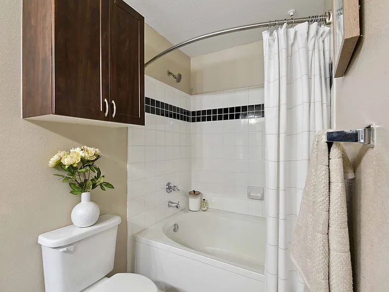 Serene bathrooms with spa-like soaking tubs and tile surrounds.