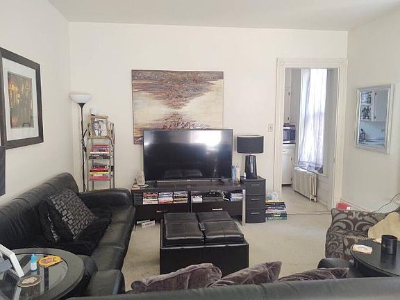 Expansive living Room 9 foot ceilings, huge windows
