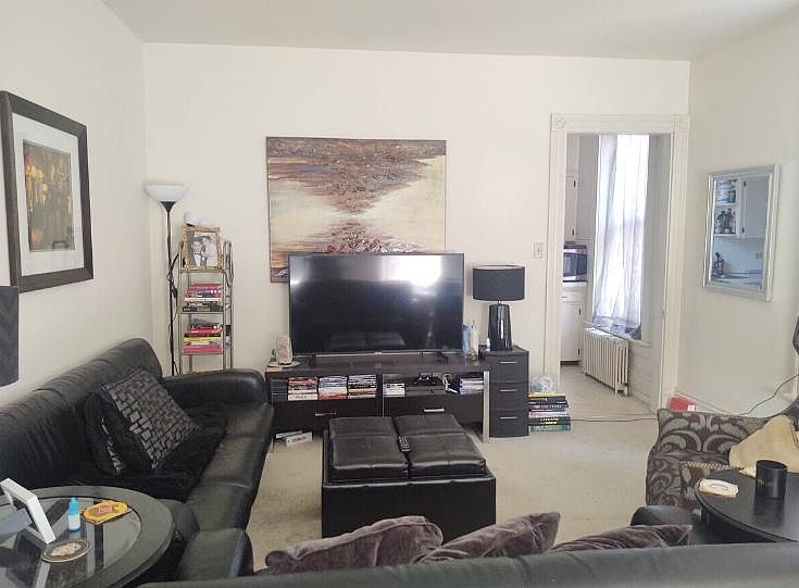 Expansive living Room 9 foot ceilings, huge windows