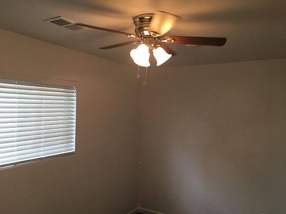 Bedroom 1 - new ceiling fan and paint