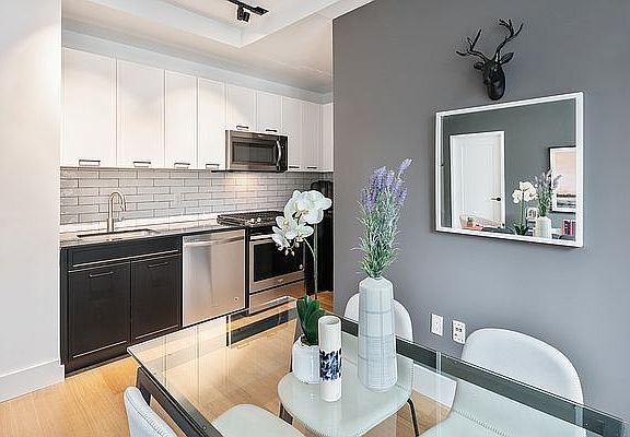 5th image of 63 Wall St APT 604