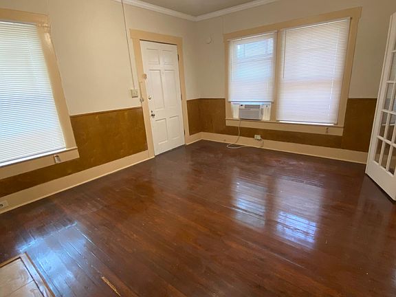 Living room with French doors into dining room