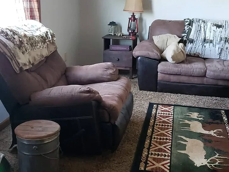 Living area from kitchen with past tenants decor