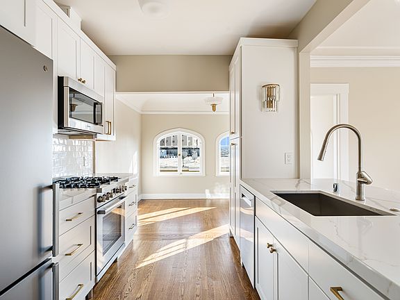 Looking through kitchen into office
