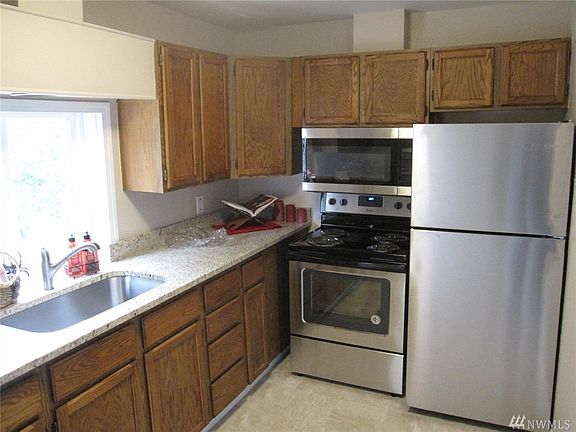New granite countertops, sink & faucet and stainless steel appliances.  And flooring.