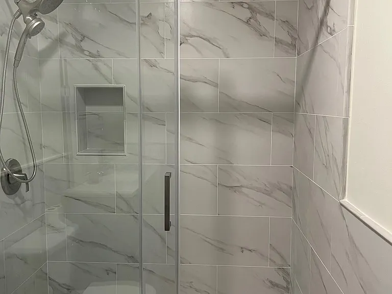 Walk in shower with dual combo spray with hand-held shower head