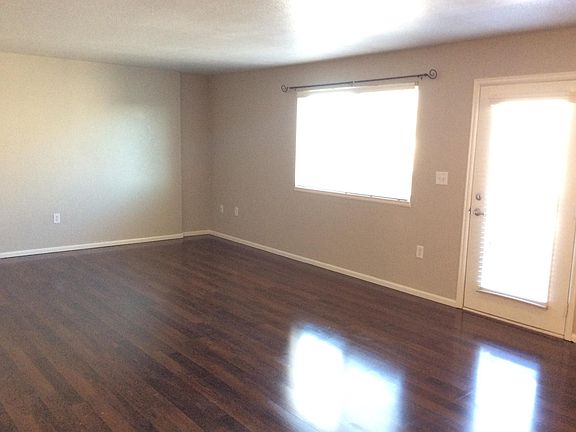 Living room has beautiful natural light.