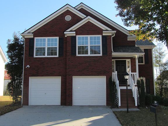 View from the street. Split level with 3br / 2bth upstairs and in-law suite with 1br / 1bth with recreational / living room area downstairs