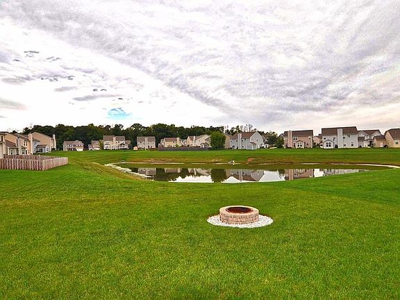 Recent install of the fire pit provides plenty of room for entertaining and a tranquil view of the pond.